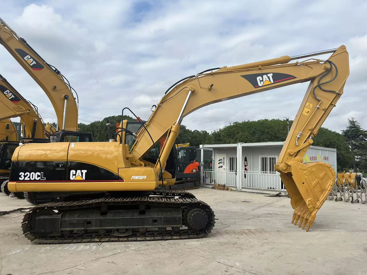 2010 Caterpillar 320CL Raupenbagger Seitenansicht 2010 Caterpillar 320CL Raupenbagger Seitenansicht