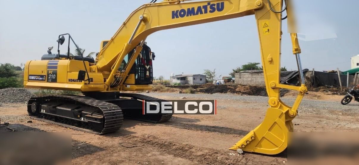 2026 Komatsu PC210LC-10M0 crawler excavator, side profile view 2026 Komatsu PC210LC-10M0 crawler excavator, side profile view