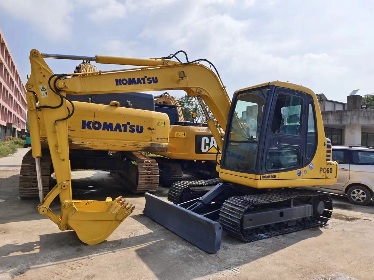 2018 Komatsu PC60-7 mini excavator, front three-quarter view 2018 Komatsu PC60-7 mini excavator, front three-quarter view