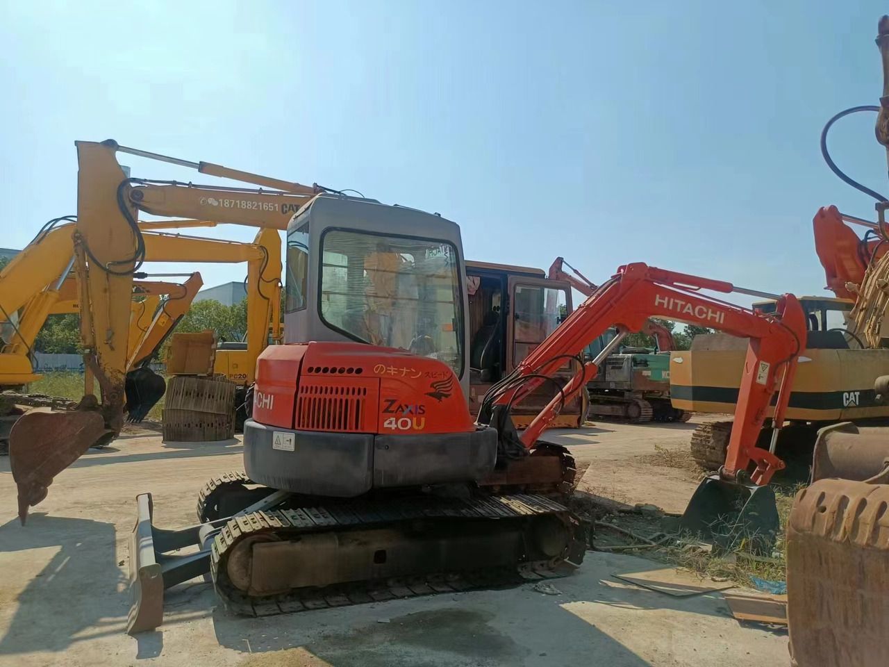 2016 Hitachi Zaxis 40U crawler excavator, side view