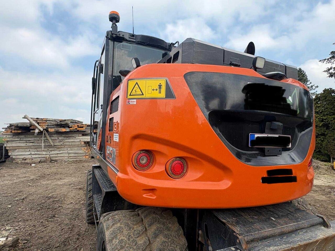 2023 Hitachi ZX155W-7 wheel excavator rear view 2023 Hitachi ZX155W-7 wheel excavator rear view