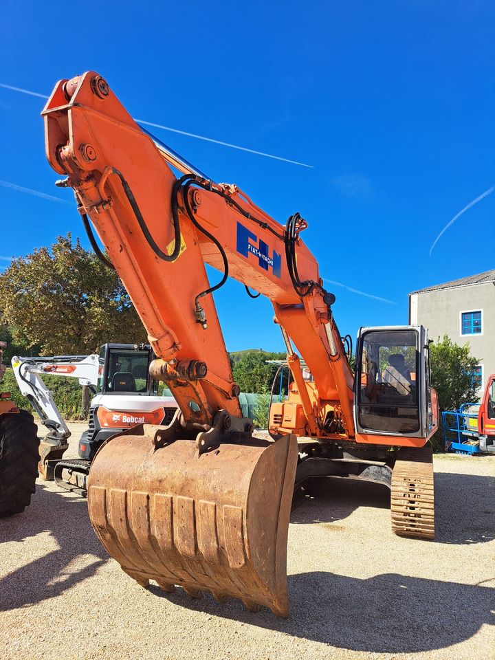 1998 Fiat-Hitachi EX 215 crawler excavator, front three-quarter view 1998 Fiat-Hitachi EX 215 crawler excavator, front three-quarter view