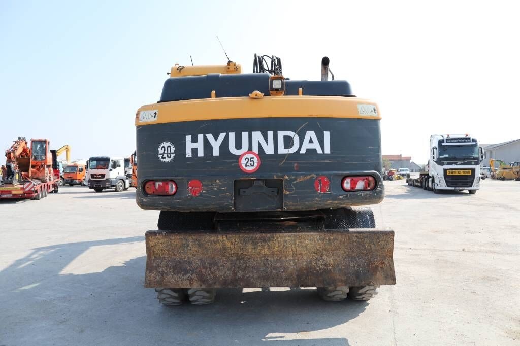 2015 Hyundai R140W-9A wheel excavator rear view 2015 Hyundai R140W-9A wheel excavator rear view