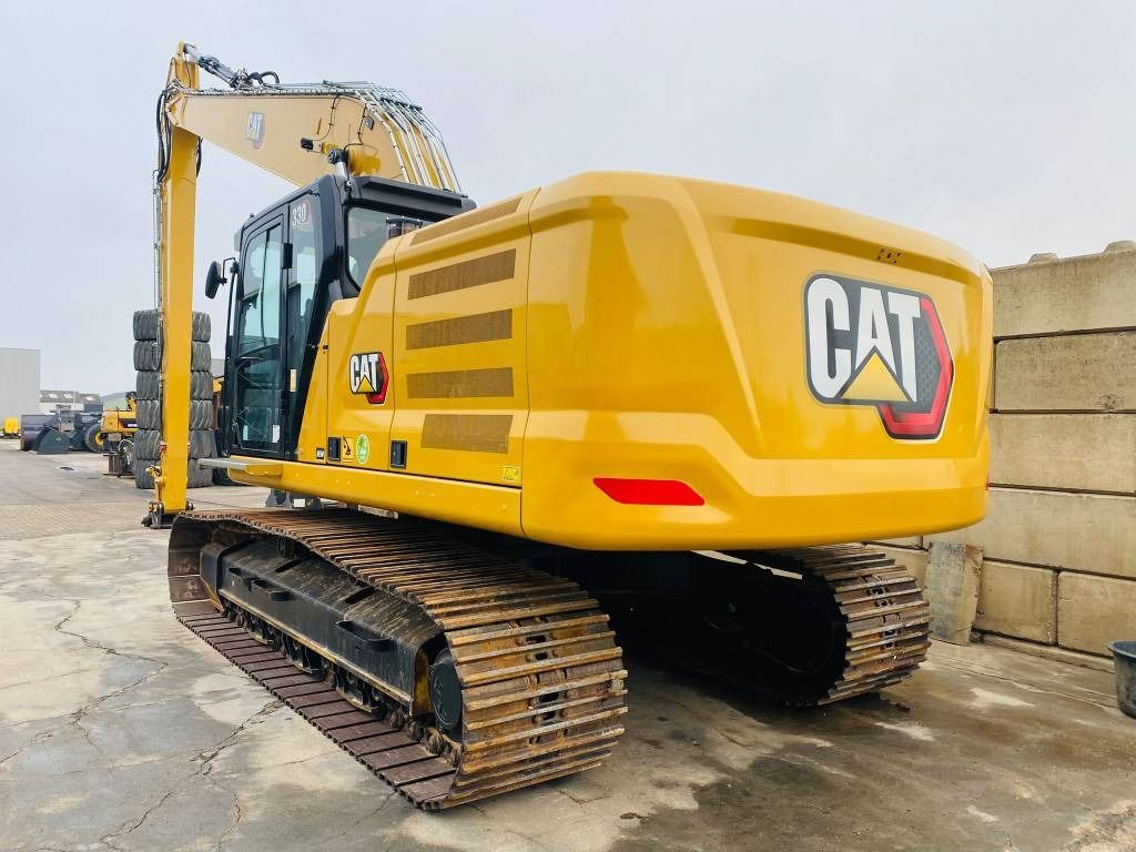 2024 Caterpillar 330 crawler excavator rear three-quarter view