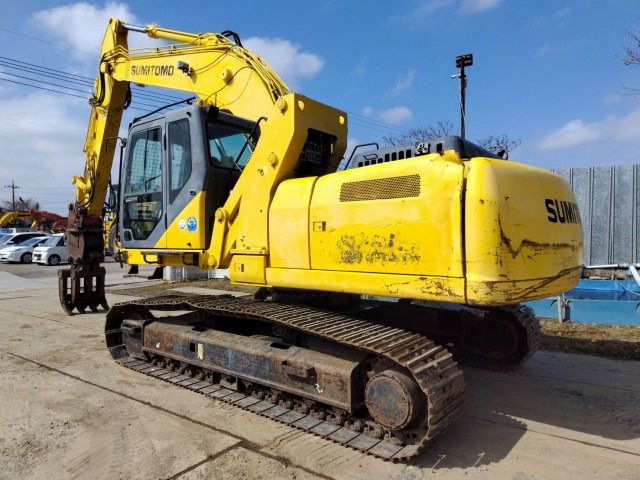 2008 Sumitomo SH240-5 crawler excavator, rear three-quarter view 2008 Sumitomo SH240-5 crawler excavator, rear three-quarter view