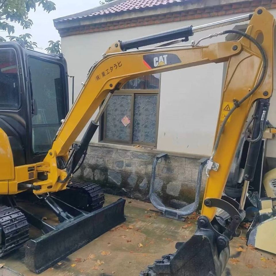 2022 Caterpillar 303.5ECR mini excavator side view 2022 Caterpillar 303.5ECR mini excavator side view