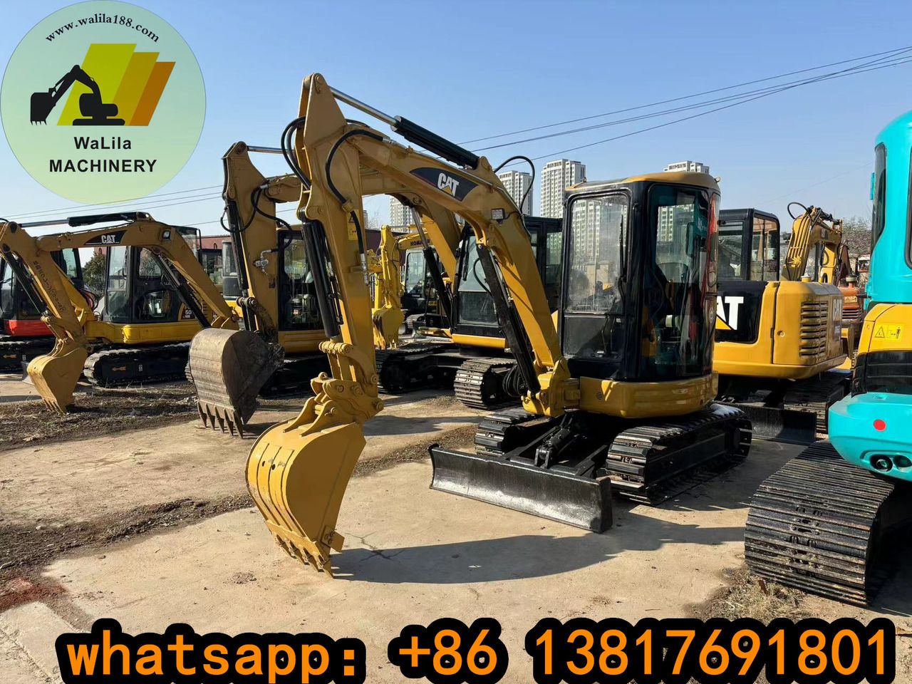 2023 Caterpillar 303CCR mini excavator, front three-quarter view