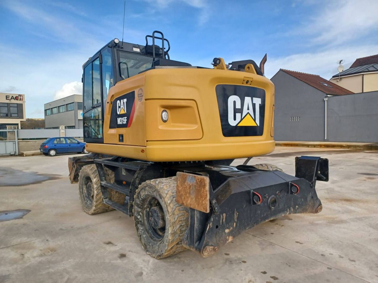 2018 Caterpillar M315F wheel excavator, rear three-quarter view