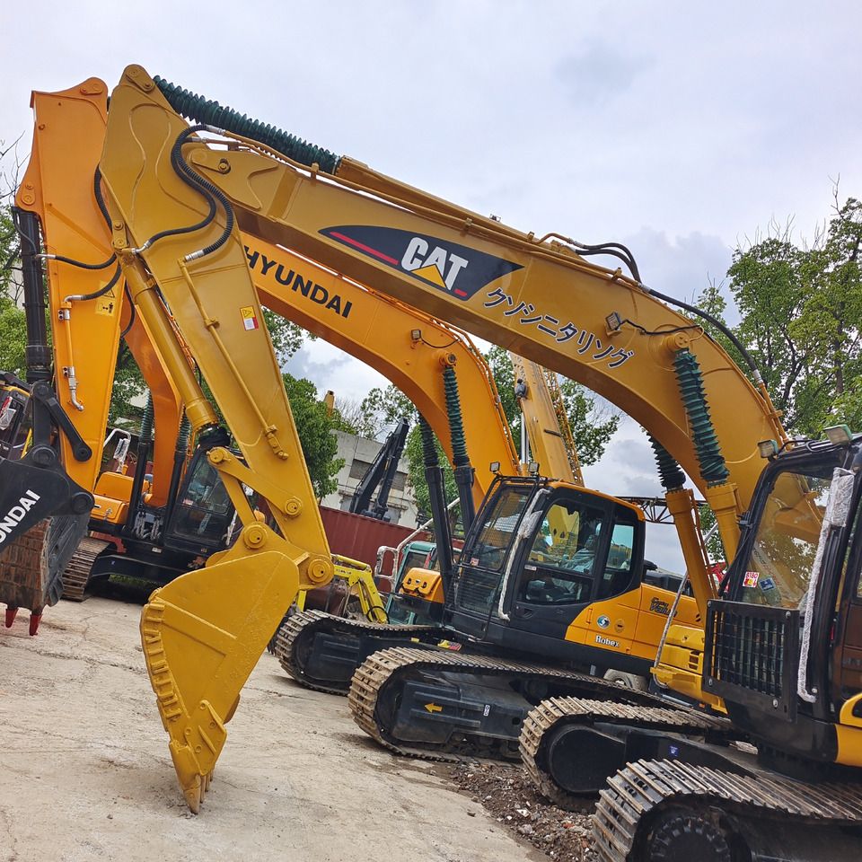 2023 Caterpillar 320CL гусеничний екскаватор, вигляд збоку