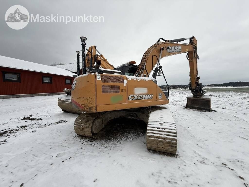 2014 CASE CX210C crawler excavator, rear three-quarter view 2014 CASE CX210C crawler excavator, rear three-quarter view