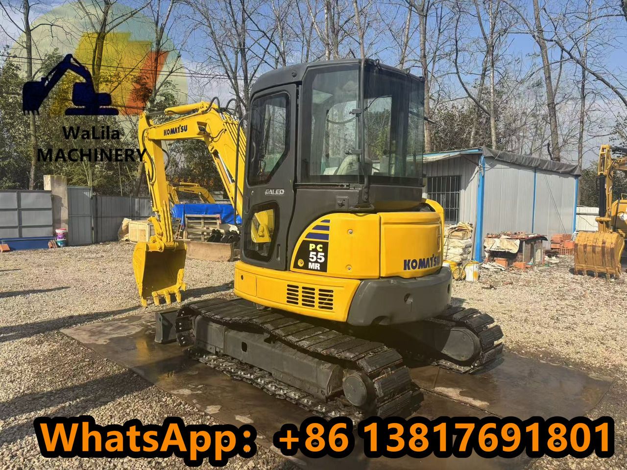 2023 Komatsu PC55MR-3 mini excavator, rear three-quarter view 2023 Komatsu PC55MR-3 mini excavator, rear three-quarter view