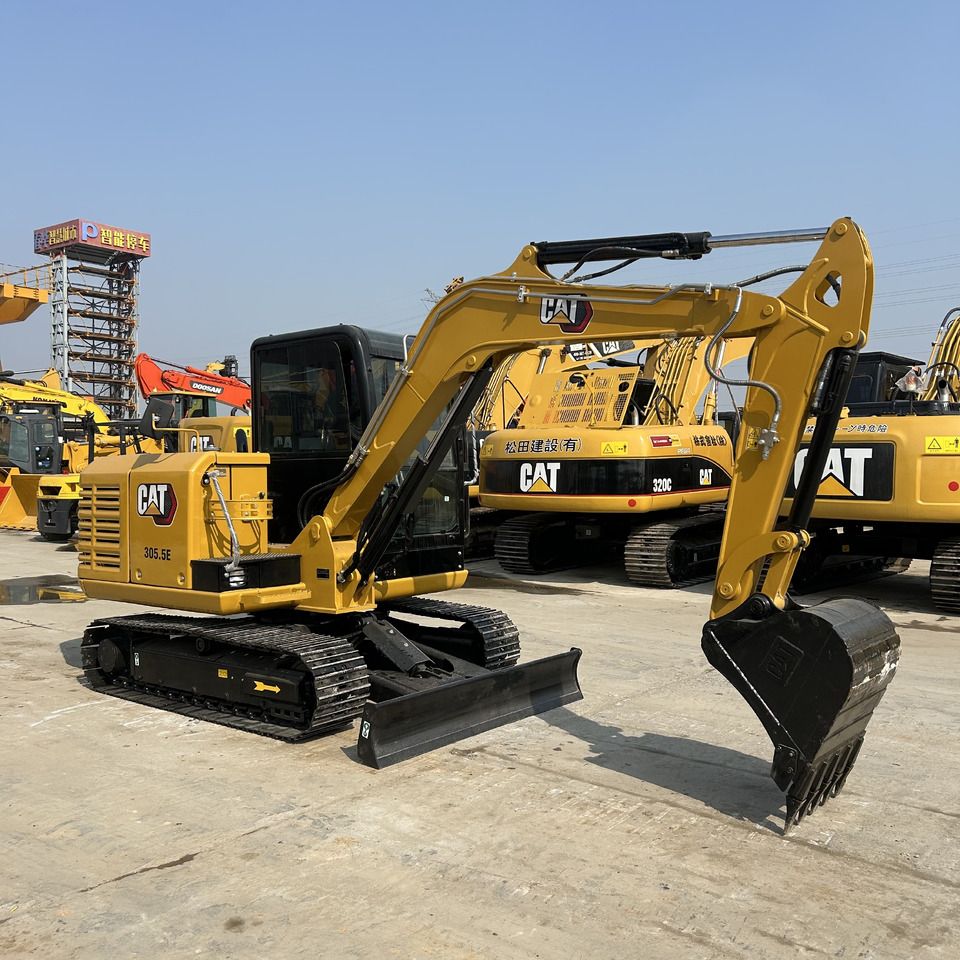 2023 Caterpillar 305.5E mini excavator, side view