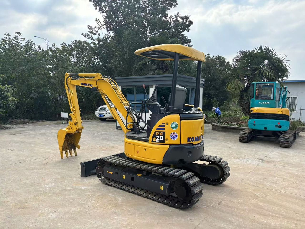 2022 Komatsu PC20 MR mini excavator, rear three-quarter view 2022 Komatsu PC20 MR mini excavator, rear three-quarter view