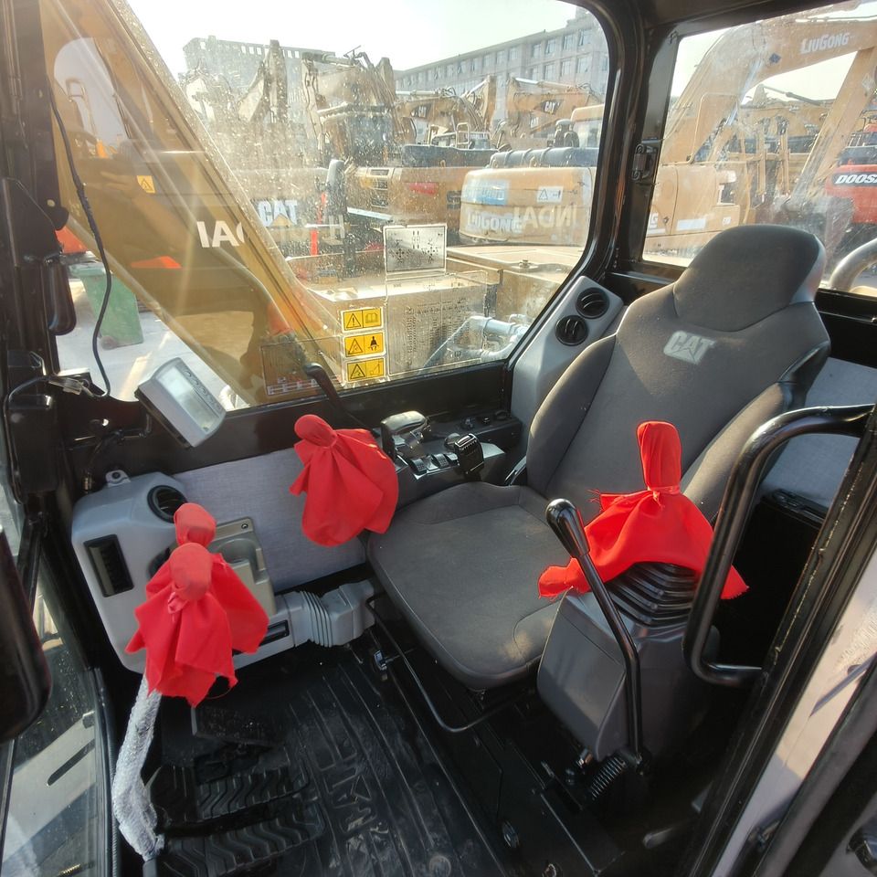 2022 Caterpillar 308E2 mini excavator interior view 2022 Caterpillar 308E2 mini excavator interior view