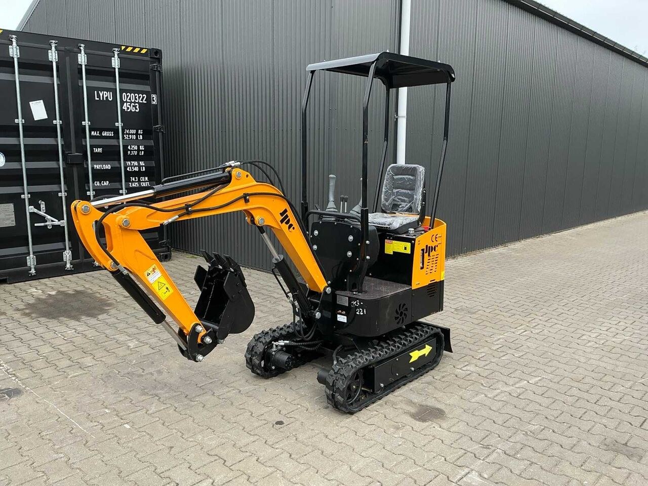 JPC HT-12 mini excavator, three-quarter view JPC HT-12 mini excavator, three-quarter view