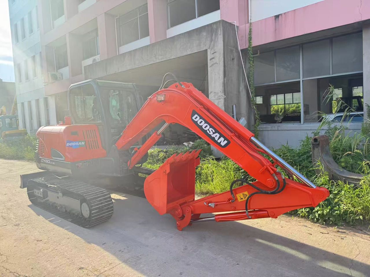 2022 Doosan DX60-9C mini excavator, side view 2022 Doosan DX60-9C mini excavator, side view