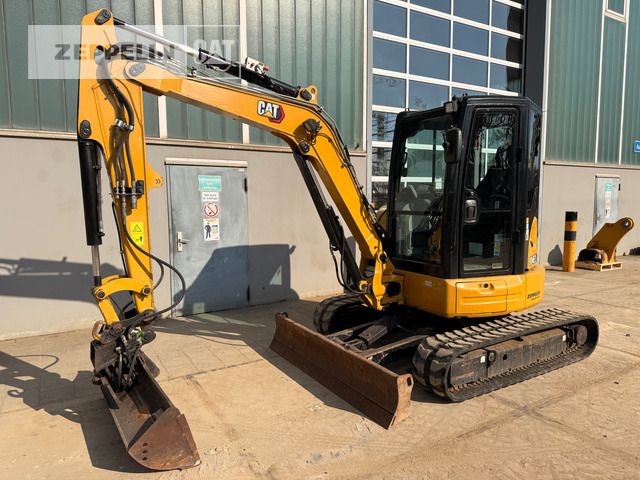 2021 Caterpillar 304ECR mini excavator side view 2021 Caterpillar 304ECR mini excavator side view