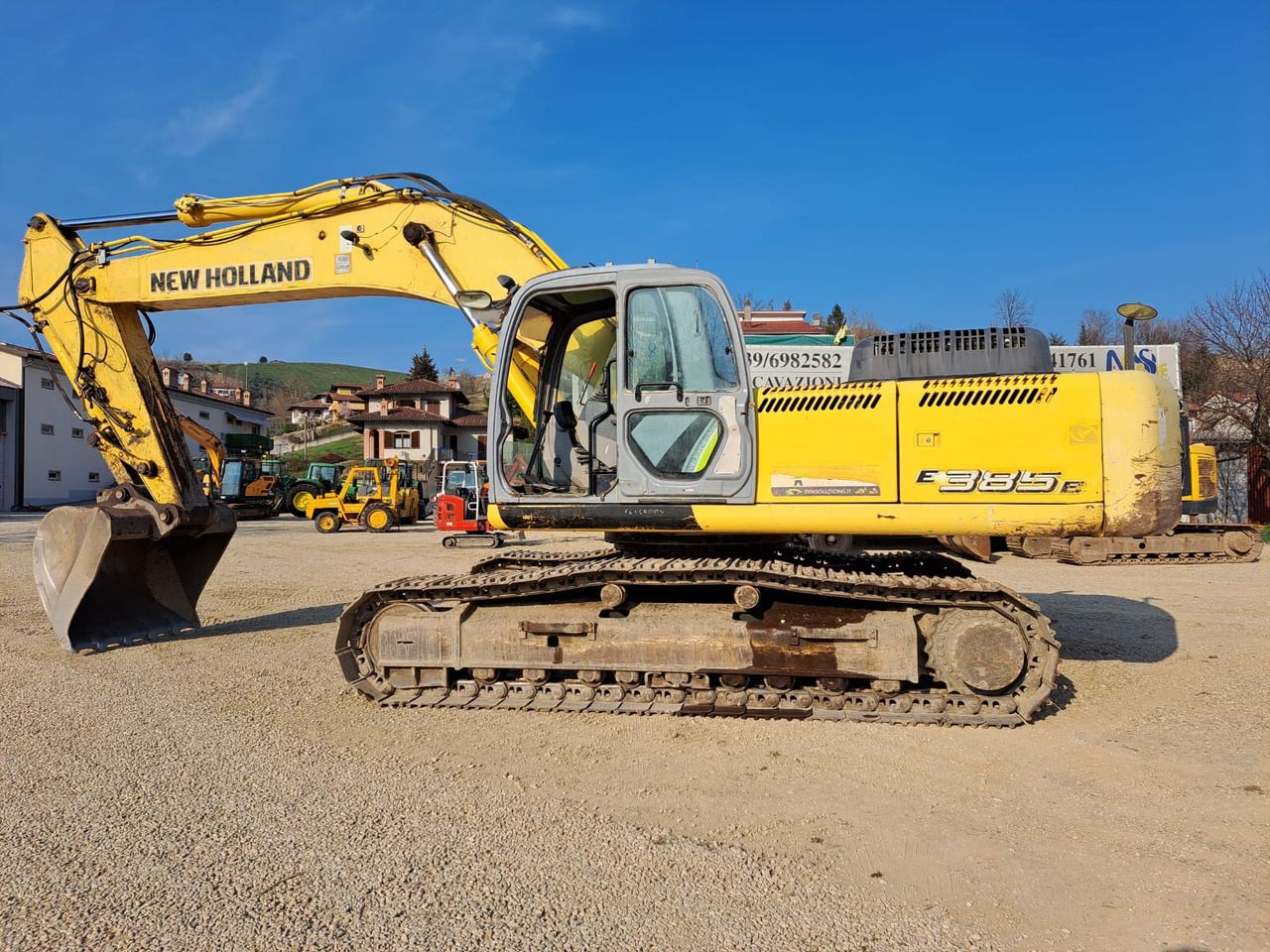 2008 New Holland E385B crawler excavator side view 2008 New Holland E385B crawler excavator side view