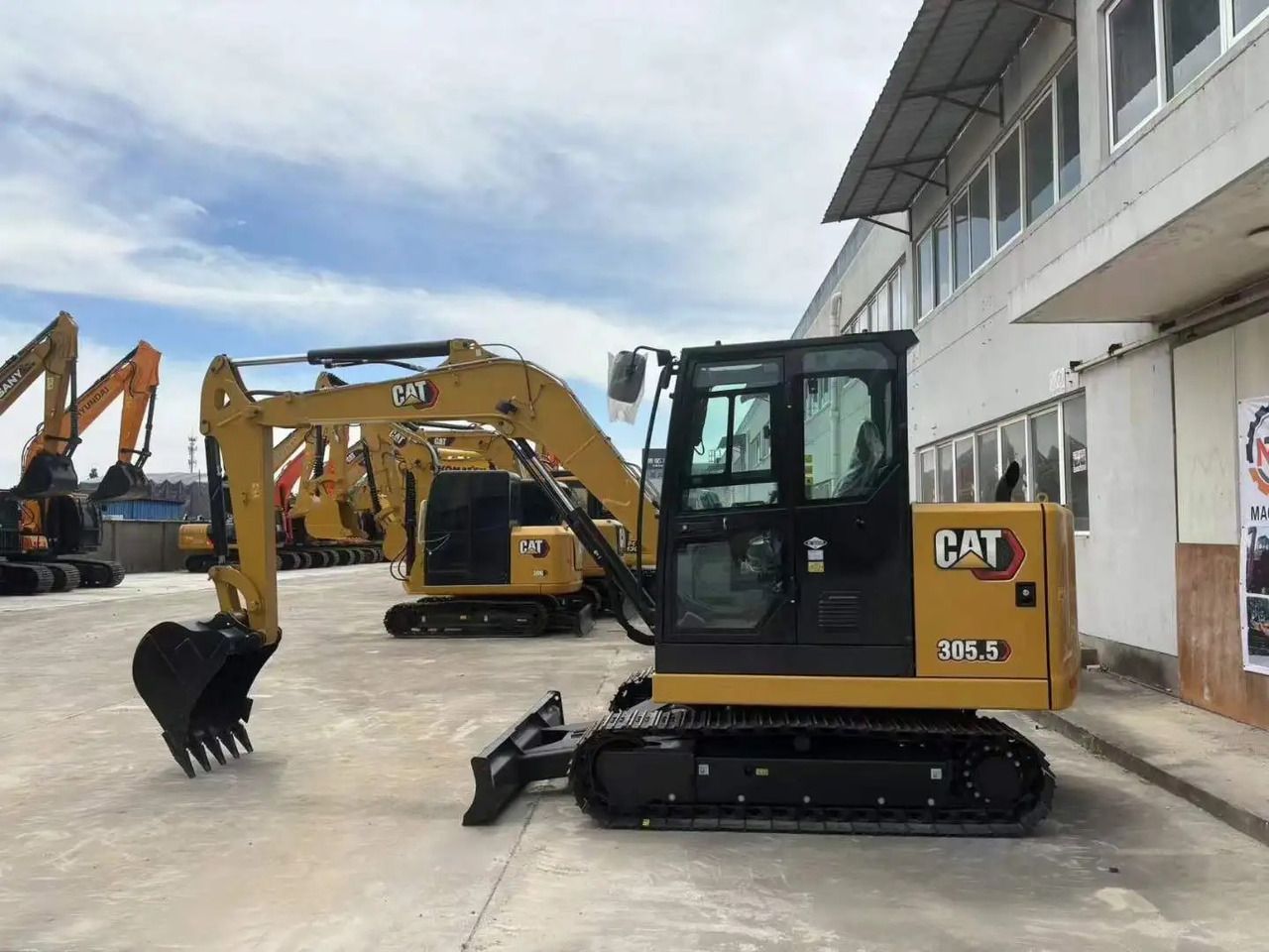 2023 Caterpillar 305.5E2 mini excavator side view 2023 Caterpillar 305.5E2 mini excavator side view