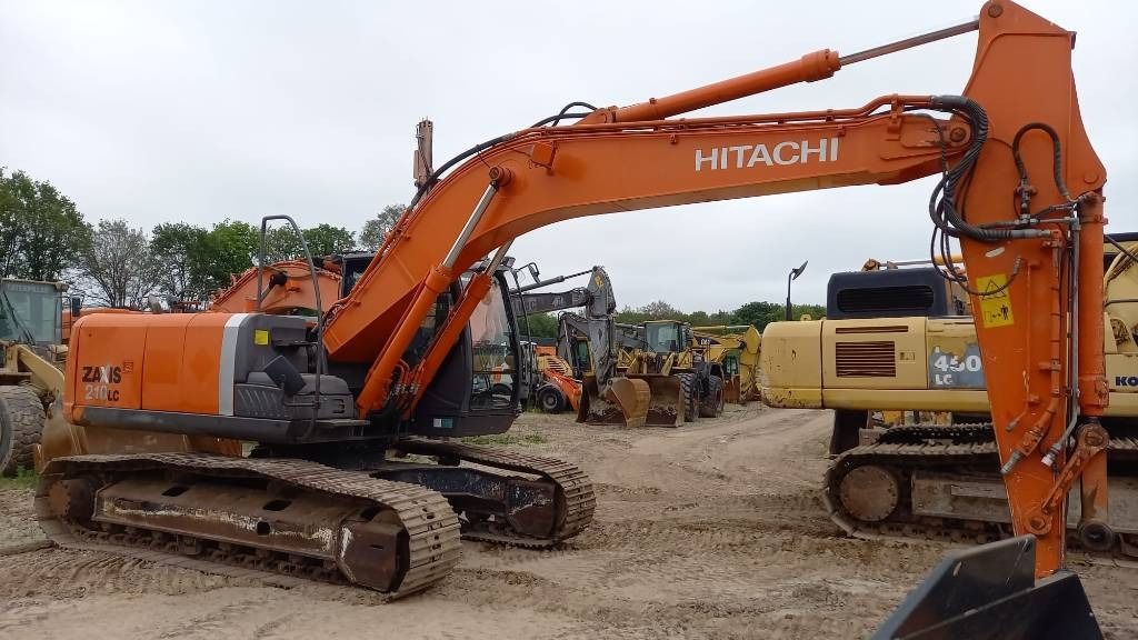 2012 Hitachi Zaxis 210LC crawler excavator, side view 2012 Hitachi Zaxis 210LC crawler excavator, side view