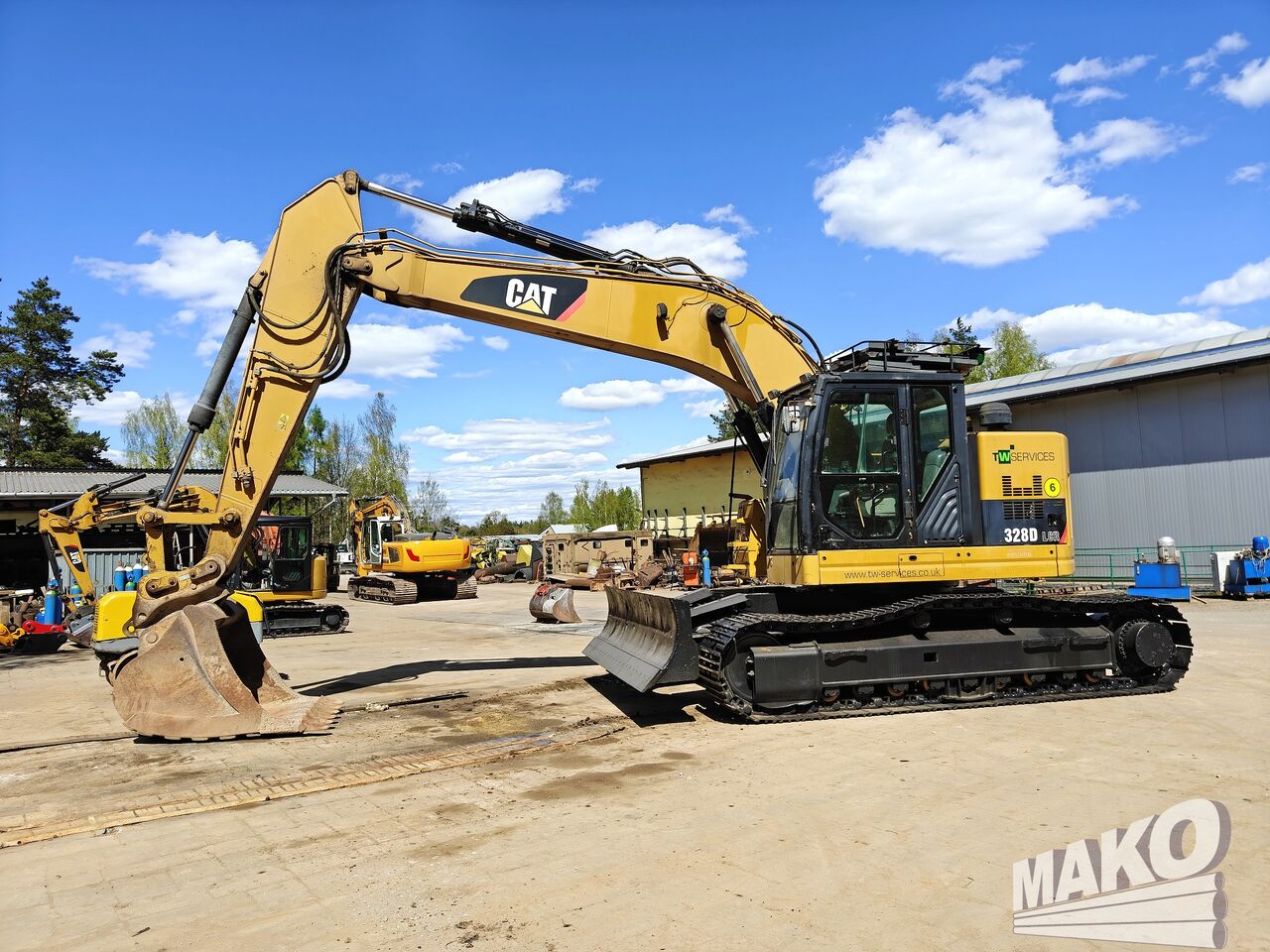 2012 Caterpillar 328D LCR crawler excavator, side profile view 2012 Caterpillar 328D LCR crawler excavator, side profile view