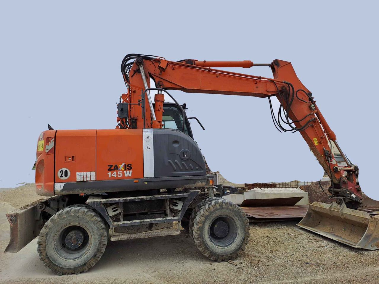 2011 Hitachi Zaxis 145W wheel excavator, side view 2011 Hitachi Zaxis 145W wheel excavator, side view