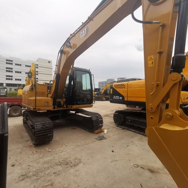 2021 Caterpillar 313D crawler excavator, side view 2021 Caterpillar 313D crawler excavator, side view