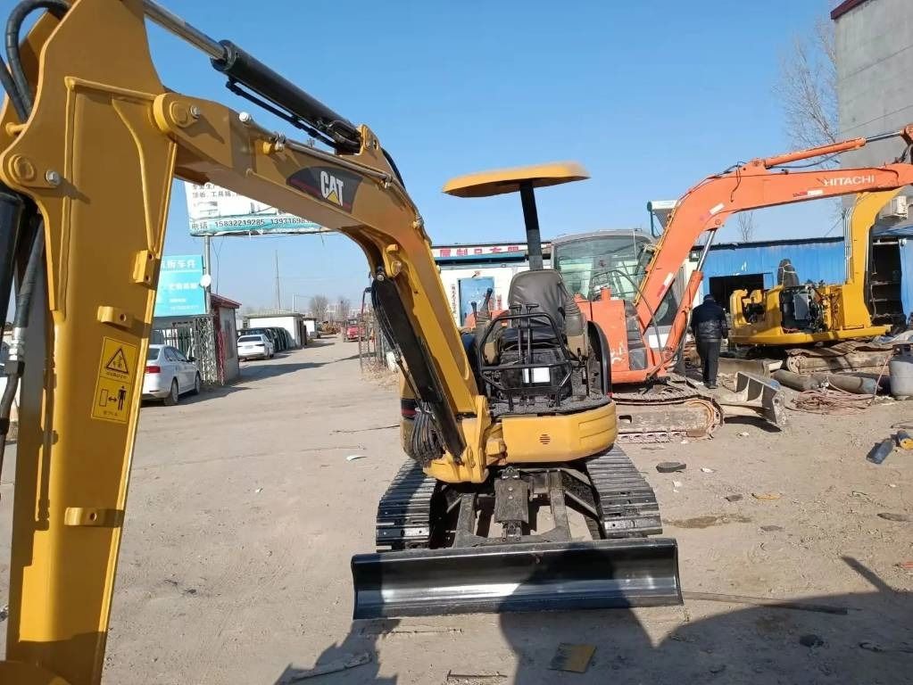 2022 Caterpillar 303CR mini excavator rear view 2022 Caterpillar 303CR mini excavator rear view