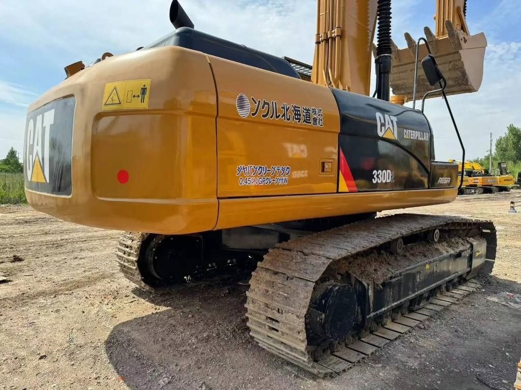 2022 Caterpillar 330D2 excavator rear three-quarter view