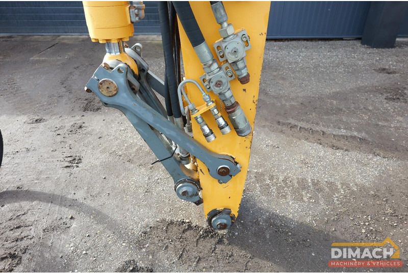 2005 Liebherr A316 excavator boom attachment detail 2005 Liebherr A316 excavator boom attachment detail