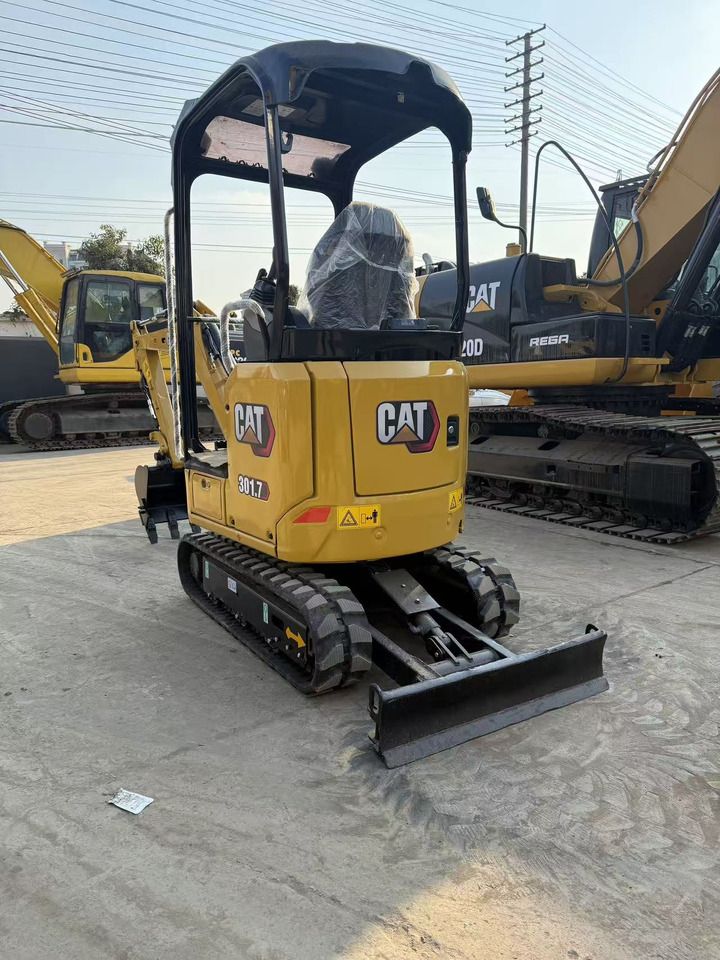 2022 Caterpillar 301.7 mini excavator, rear three-quarter view 2022 Caterpillar 301.7 mini excavator, rear three-quarter view
