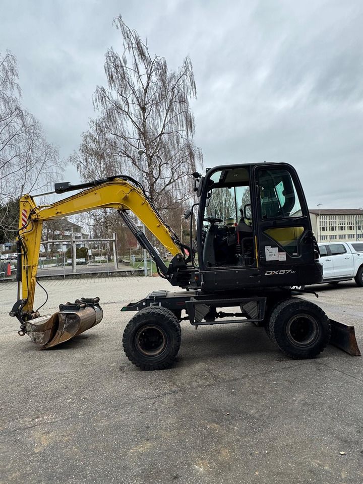 2020 Doosan DX57W-5 wheel excavator, side profile view 2020 Doosan DX57W-5 wheel excavator, side profile view