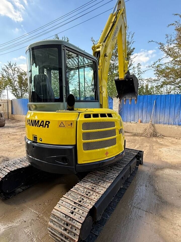 2025 Yanmar VIO55 mini excavator, rear three-quarter view 2025 Yanmar VIO55 mini excavator, rear three-quarter view