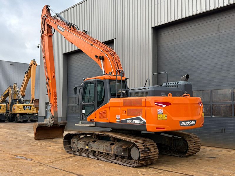 2022 Doosan DX225LC-7 crawler excavator, rear three-quarter view 2022 Doosan DX225LC-7 crawler excavator, rear three-quarter view