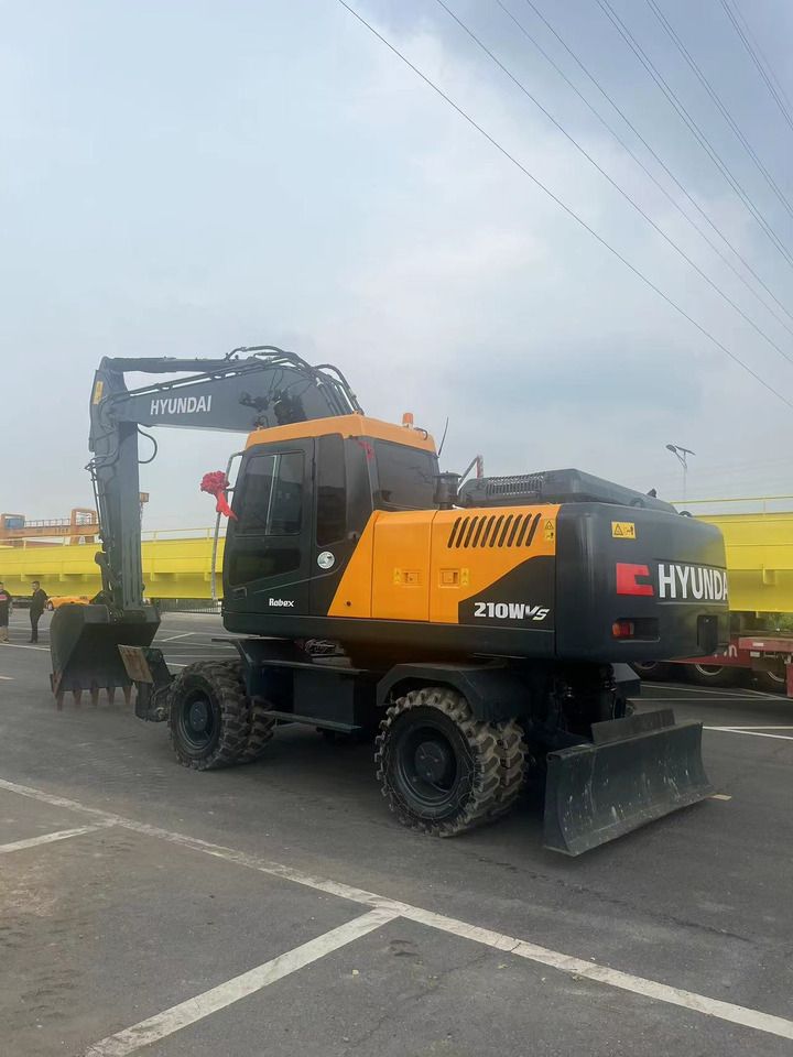2023 Hyundai R210W-9S wheel excavator, rear three-quarter view
