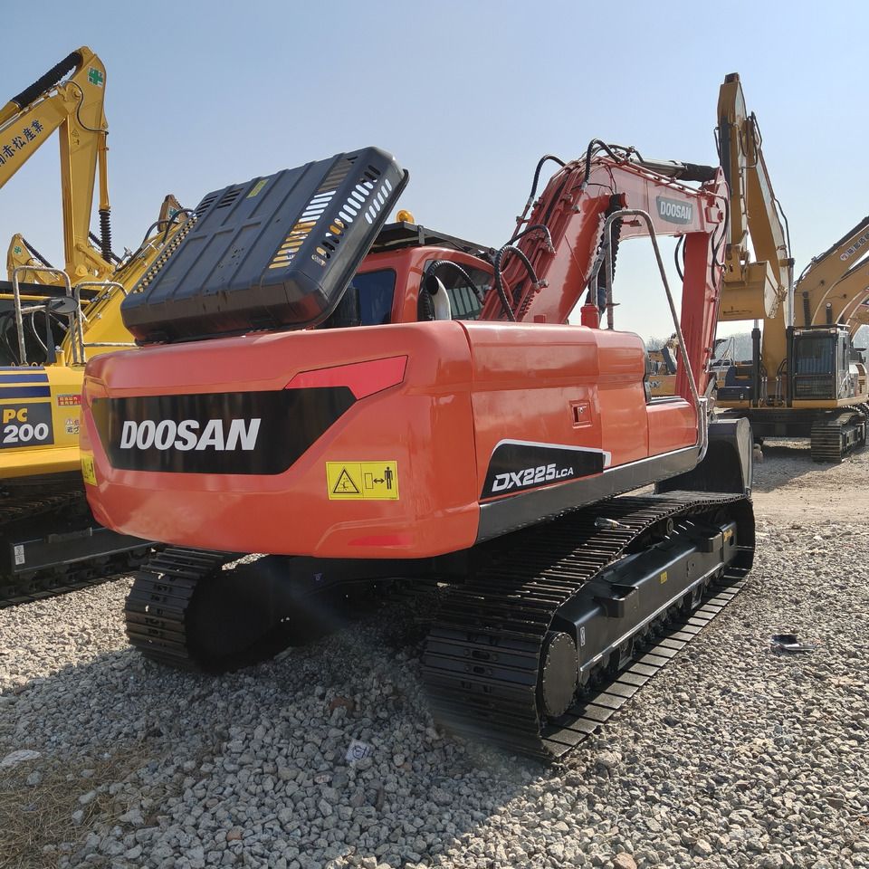 2024 Doosan DX225LCA crawler excavator, rear three-quarter view