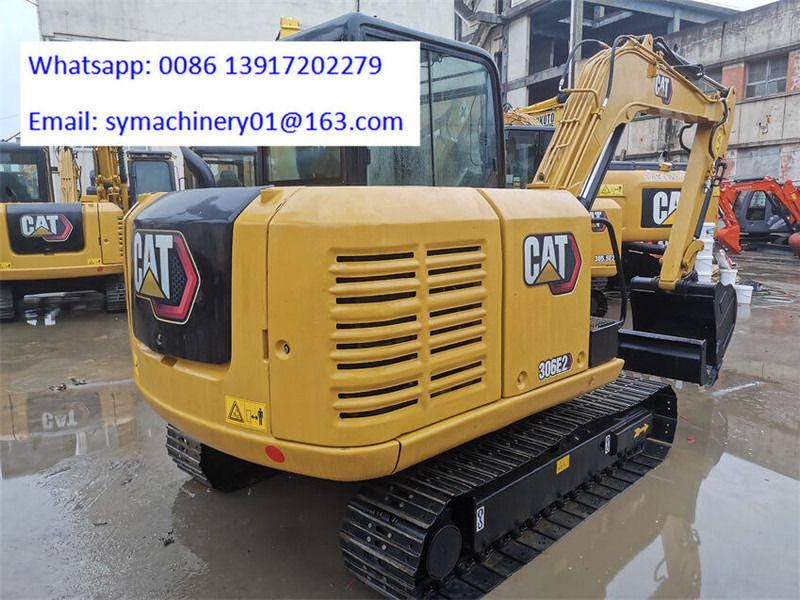 2023 Caterpillar 306E2 mini excavator, rear three-quarter view 2023 Caterpillar 306E2 mini excavator, rear three-quarter view