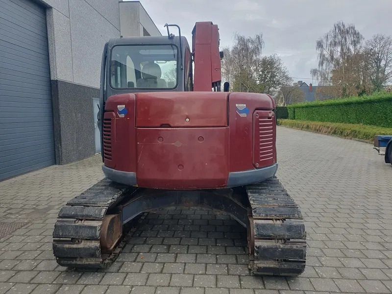 2005 New Holland E70 mini excavator rear view 2005 New Holland E70 mini excavator rear view