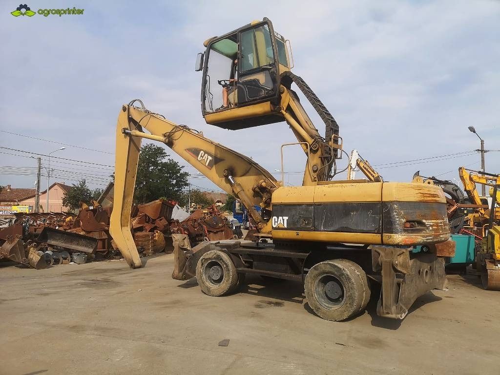 2005 Caterpillar M322C MH material handler, side view
