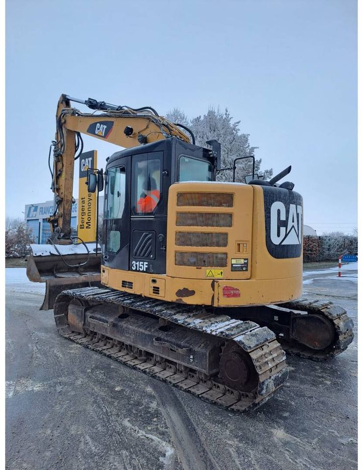 2018 Caterpillar 315F crawler excavator, rear three-quarter view 2018 Caterpillar 315F crawler excavator, rear three-quarter view