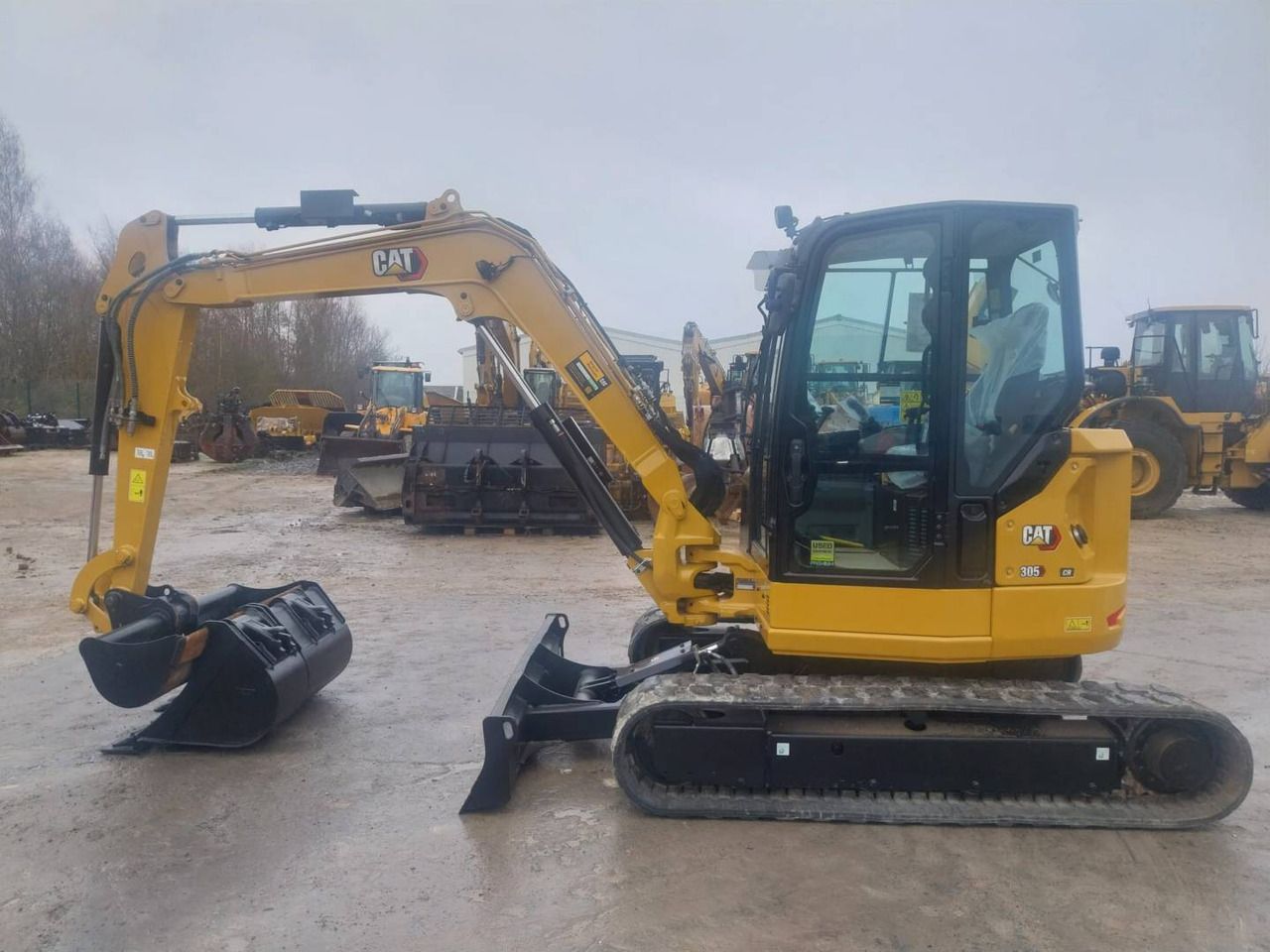 2023 Caterpillar 305 CR crawler excavator, side view