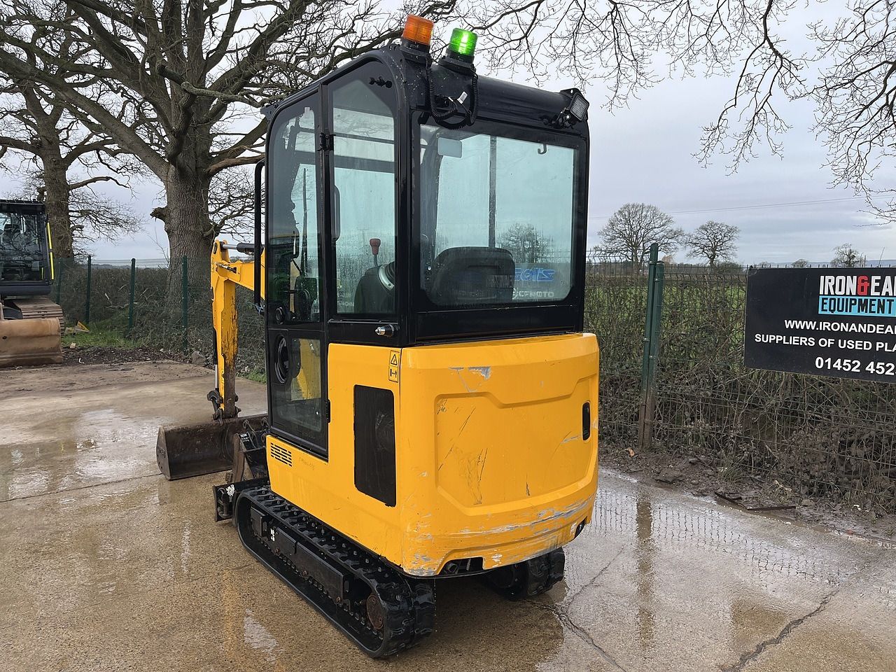 2022 JCB 16C-1 mini excavator rear three-quarter view 2022 JCB 16C-1 mini excavator rear three-quarter view
