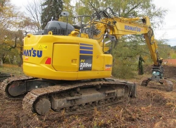 2022 Komatsu PC228USLC-11 crawler excavator, rear three-quarter view
