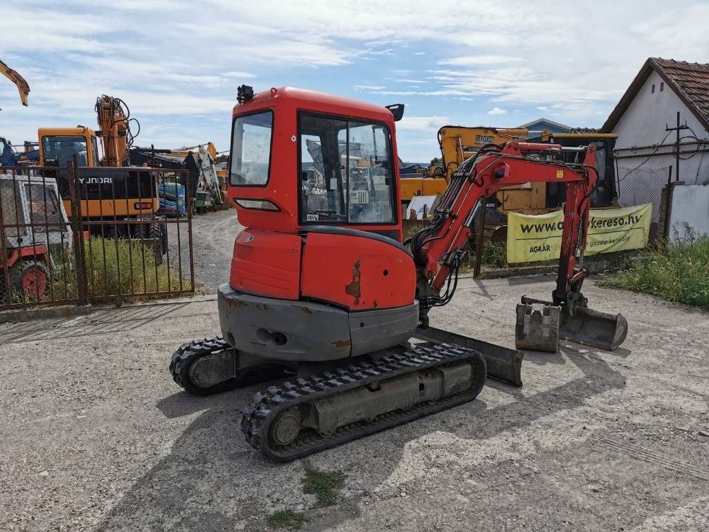 2010 Kubota U35-3 mini excavator, rear three-quarter view 2010 Kubota U35-3 mini excavator, rear three-quarter view