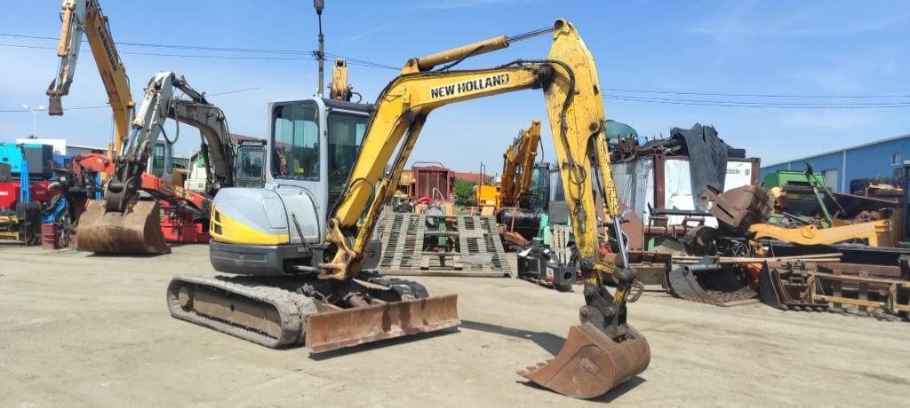 2006 New Holland E50.2C mini excavator, side view 2006 New Holland E50.2C mini excavator, side view