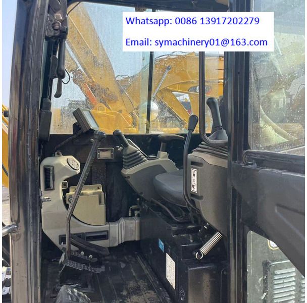 2023 Caterpillar 305.5E2 mini excavator interior view