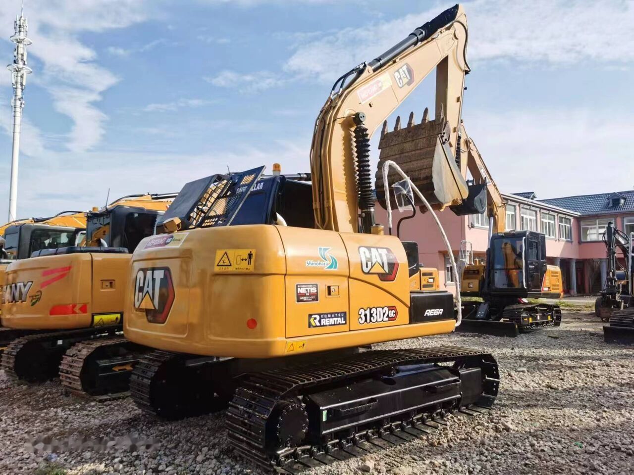 2023 Caterpillar 313D2 GC crawler excavator, rear three-quarter view 2023 Caterpillar 313D2 GC crawler excavator, rear three-quarter view