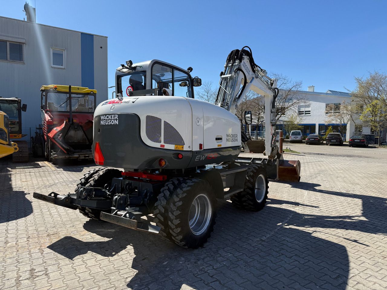 2020 Wacker Neuson EW100 wheel excavator, rear three-quarter view 2020 Wacker Neuson EW100 wheel excavator, rear three-quarter view