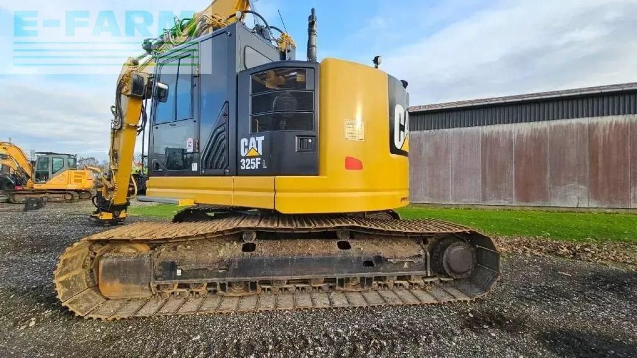 2016 Caterpillar 325F L crawler excavator, rear three-quarter view