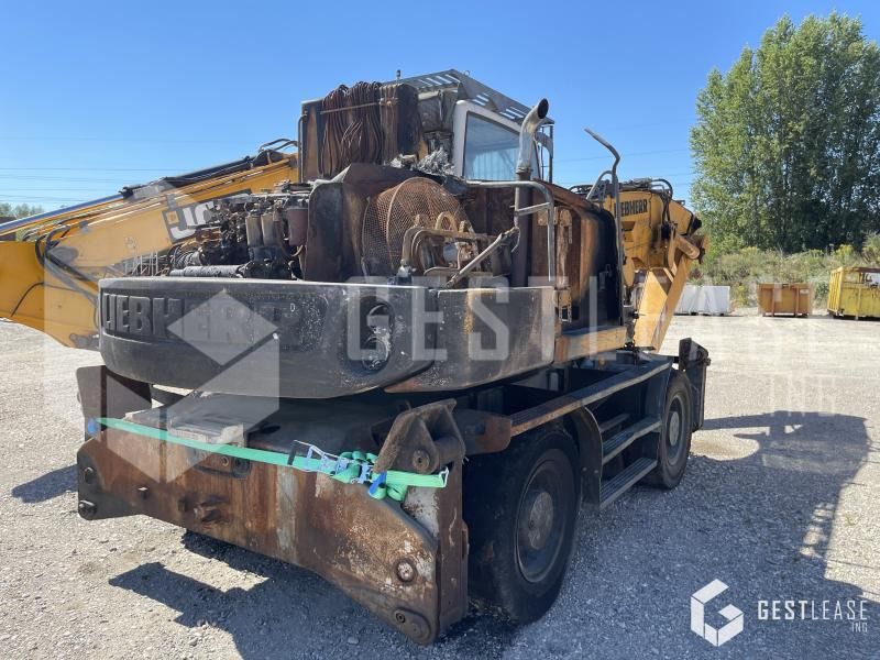 2010 Liebherr A316 wheel excavator rear view 2010 Liebherr A316 wheel excavator rear view